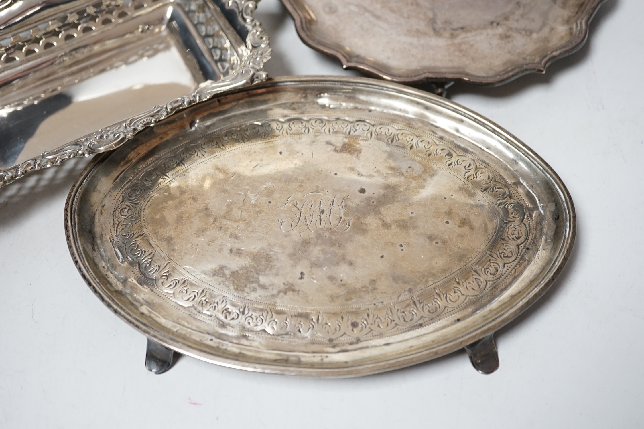 Sundry silver items including a Georgian cream jug, pair of later pierced bonbon dishes, Georgian teapot stand (a.f.), waiter, sauce boat and toastrack, 20.8oz.